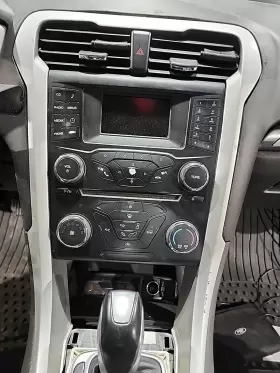 254.FD1L14 FORD Front Center Dash Radio Bezel Surround Panel