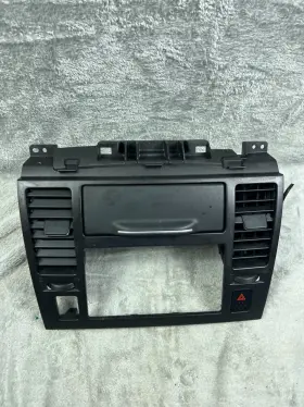 254-201099 NISSAN Center Dash Radio Hazard Bezel Air Vents