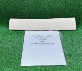 1002301-22-B TESLA Dash Glove Box Storage Lower Cover Panel
