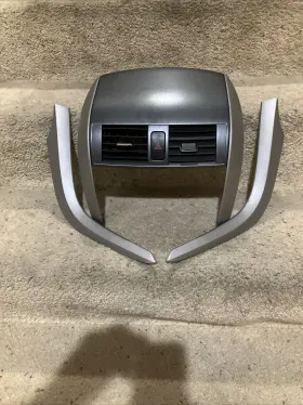 55663-12120 TOYOTA Center Dash Vent Bezel Radio Corolla