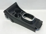 07-11 Nissan Versa Center Console Cup Holder Automatic Shifter Bezel 96941el00a. Fixed Price $70.00.