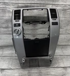 2003-2009 Toyota 4runner Center Dash Radio Surround Bezel (read). Fixed Price $175.00.