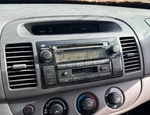02 03 04 Oem Toyota Camry Dash Radio Cd Player Bezel Trim Clock Air Vent Gray. Fixed Price $47.49.