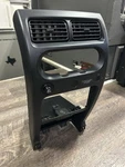 1998-2004 Nissan Frontier 2002-2004 Xterra Radio Bezel W/ Vents & Switches Oem. Fixed Price $108.99.