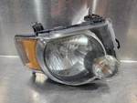 08 09 10 11 12 Ford Escape Headlamp Assembly Right. Fixed Price $40.00.