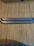 Mazda Cx-9 Front Lighted Door Entry Panels Genuine Pair Missing 3 Locking Pla. Fixed Price $230.00.