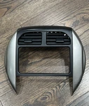 2004-2005 Toyota Rav4 Center Dash Radio Trim Bezel With Air Vents Silver Oem. Fixed Price $75.00.