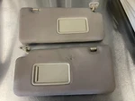 Nissan Versa Sun Visor Sunvisors Pair Set Driver Passenger Gray Double Mirror. Fixed Price $65.67.