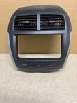 2011 - 2016 Mitsubishi Outlander Sport Center Dash Radio Bezel Oem. Fixed Price $85.00.