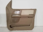 Tan Front Right Passenger Door Trim Panel Fits 03 04 05 06 Ford Expedition. Fixed Price $200.00.