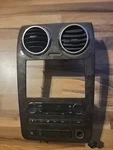 05-07 Ford Freestyle Center Dash Radio Trim Bezel Heater Control Wood Grain Vent. Fixed Price $84.00.