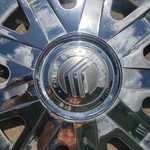 ** Mercury Grand Marquis Wheel Center Cap 04 05 06 07 08 09 3w33-1130-ba Hubcap. Fixed Price $125.00.
