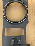 04-08 Mazda Rx-8 Center Console Manual Shifter Trim With Heated Seat Switches. Fixed Price $70.00.