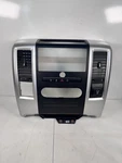 Oem 09-12 Dodge Ram Center Dash Radio Bezel Console Version. Fixed Price $275.00.